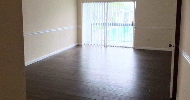Building Photo - Stunning all remodeled 2/1.5 condo with Am...