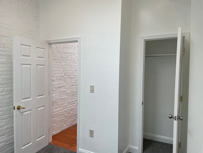 Building Photo - Charming 2-Bedroom, 1.5-Bathroom Brick Townhouse in Pigtown