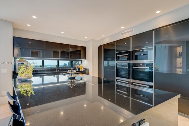 Building Photo - 18555 Collins Ave