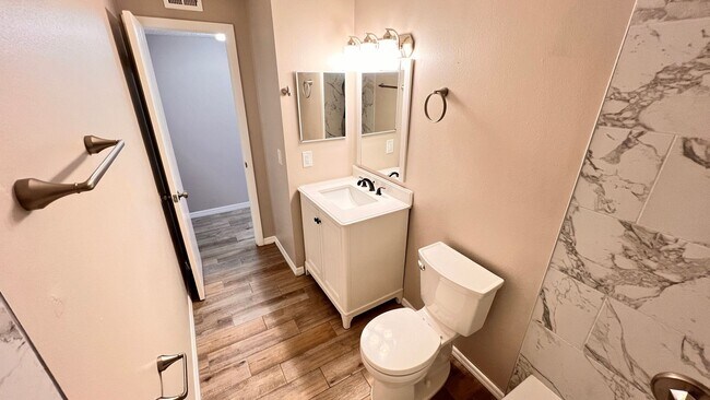 Building Photo - NEWLY RENOVATED 3 Bedroom/2 Bath Unit! Was...