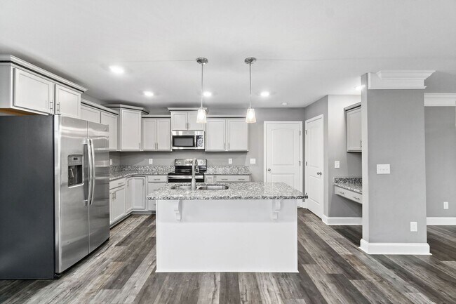 Building Photo - Pet Friendly Three Bedroom with Bonus!