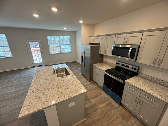 Building Photo - Brand New 4BR 2.5BA Townhome