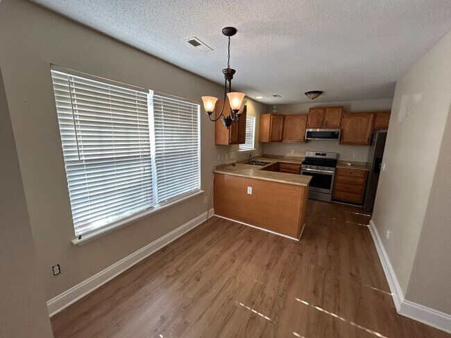 Building Photo - COMING SOON! N Greensboro, 4/2.5 home off of N Church St near Lake Jeanette & I-840