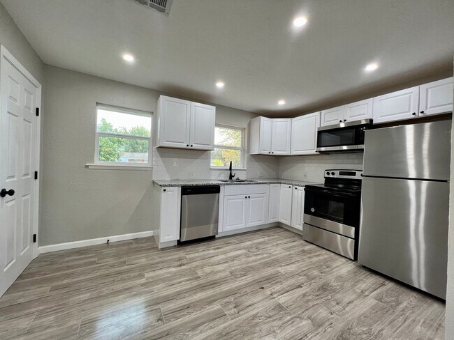 Building Photo - 4817 NW Pollard- COMING SOON!