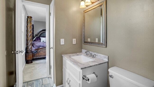 Building Photo - For Rent : 4BR, 1 1/2BA home with fenced in back yard and storage building.