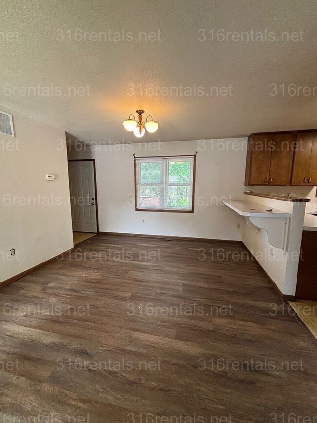 Building Photo - Three bed two bath house available now!
