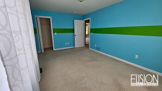 Building Photo - FREE July Rent for this Quiet, Four Bedroo...