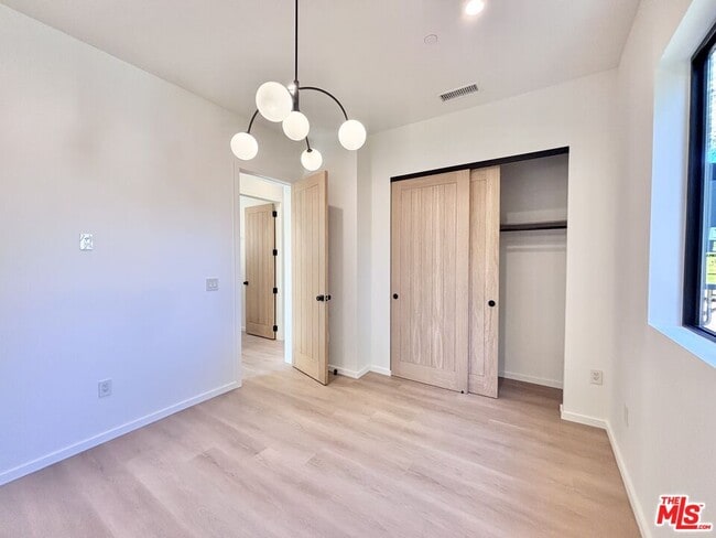 Building Photo - 17850 Saticoy St