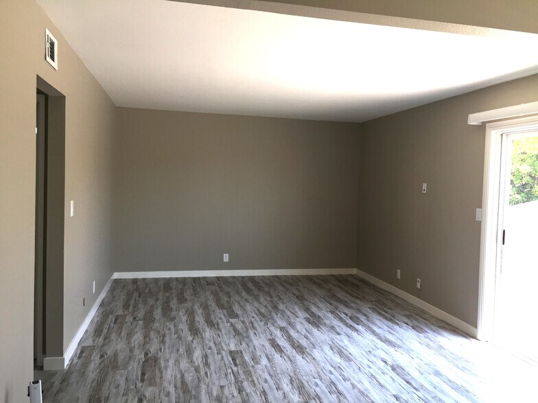 Living Room, Slider to Balcony - 10678 Walnut St