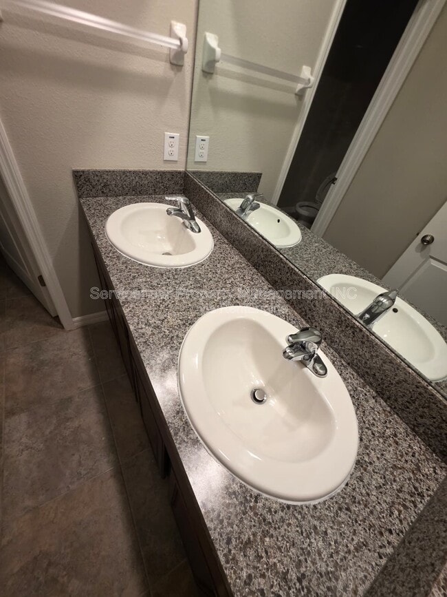 Building Photo - 7418 Rosy Periwinkle Ct