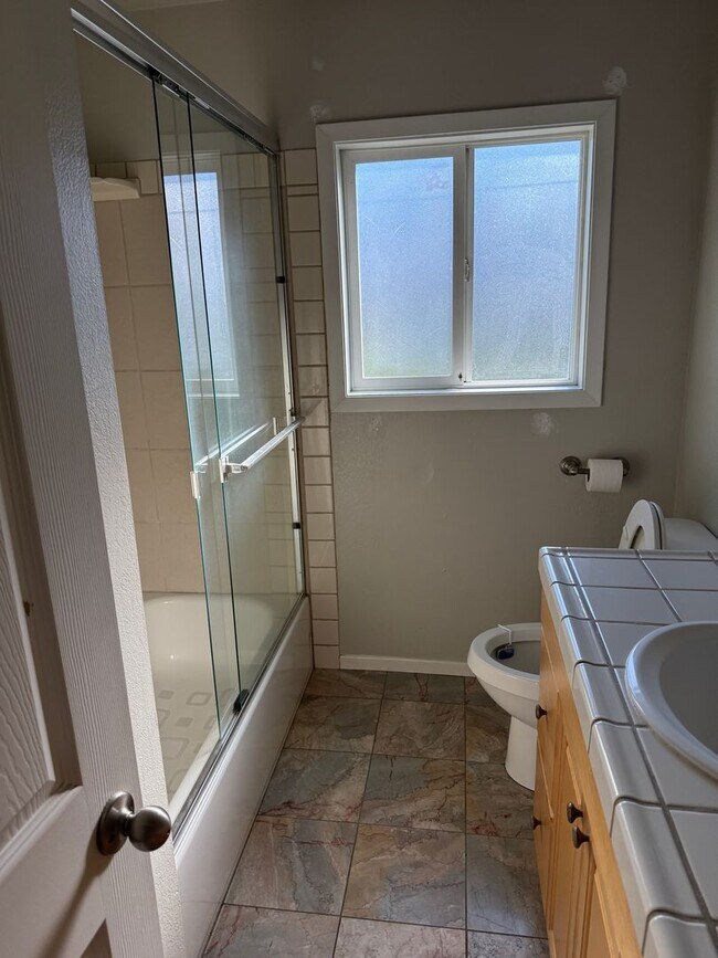 Building Photo - Peaceful Setting with Central Location!