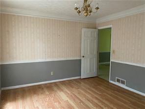 Building Photo - 1009 Hidden Hollow Dr