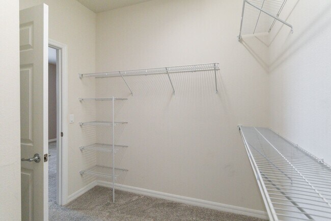 Building Photo - Gorgeous Energy Efficient 4/2 Home in Gated Community Close to Lake Nona