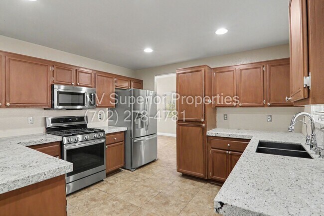 Building Photo - NW!! 4 bedrooms!! Bed & Bath DownStairs!!! RV Parking!!! Synthetic Grass Front yard!! Real Grass ...