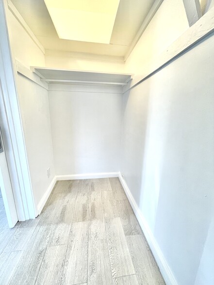 Walk-In Closet Side 1 - 128 Elm Ave