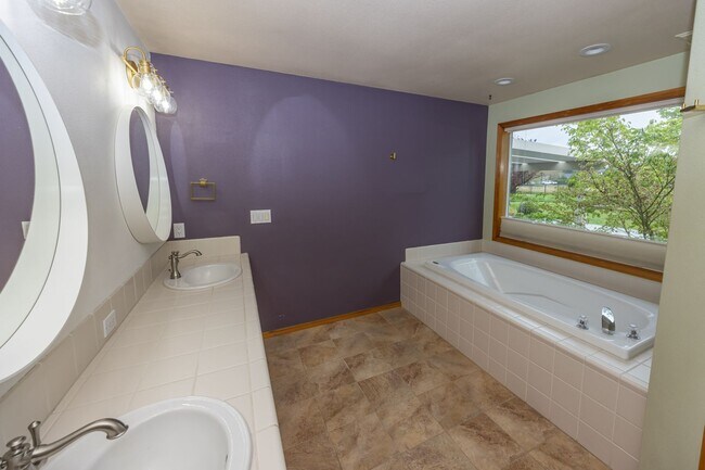 Building Photo - One Level Home - Three Bedroom + Bonus with AC / Beautiful Yard!