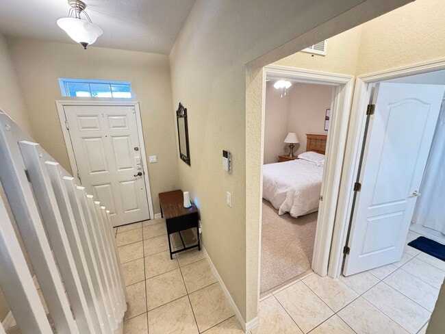 Building Photo - Fully Furnished 5-Bed End-Unit Townhome with Hot Tub in Gated Coral Cay! WASHER & DRYER INCLUDED!