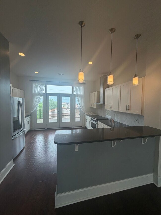 Building Photo - Luxury 3 Bedroom Condo in the Heart of Lawrenceville
