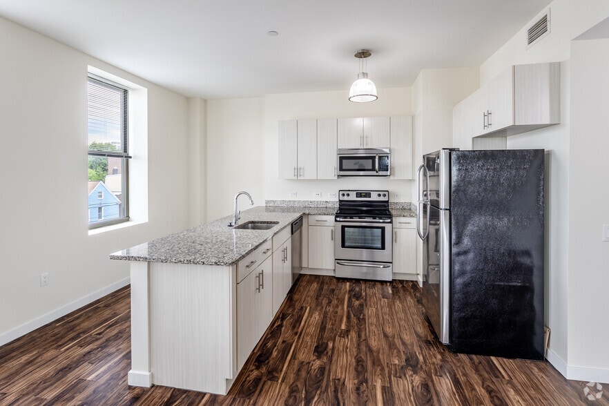 2BR, 1BA - 829SF - Kitchen - The Beacon Jersey City