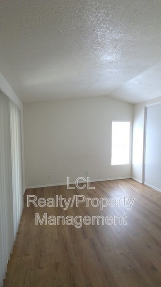 Building Photo - 12225 Pluto Dr