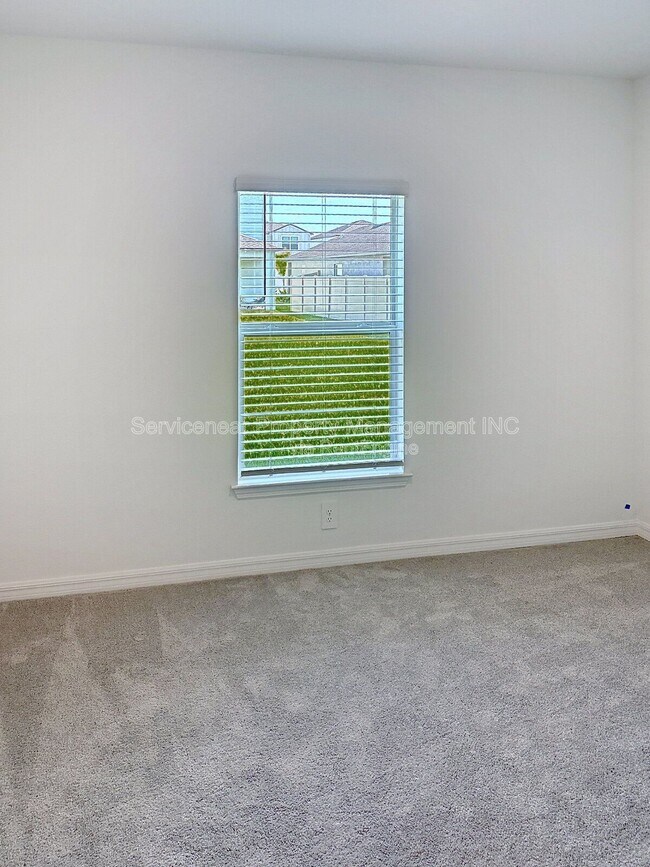 Building Photo - 8438 Blue Wave Ln E