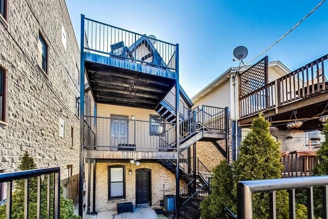 Building Photo - 1730 W Beach Ave