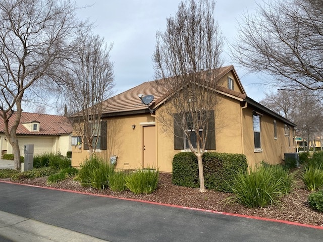 Side of House with Side Garage Door - 1000 Orleans Ct