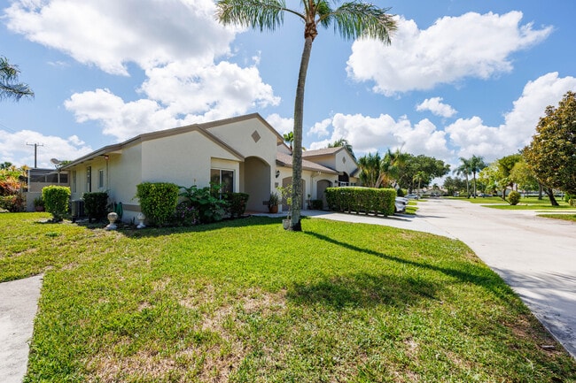 Building Photo - 9497 Boca Gardens Pkwy