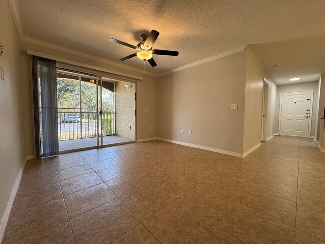 Building Photo - Oviedo 2/2 Condo with Tile & LVP Flooring, Updated Baths, New Paint & Appliances!