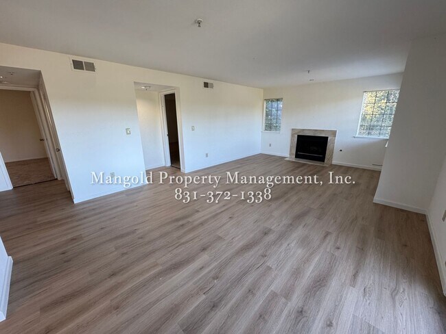 Building Photo - Spacious 2-Bed, 2-Bath Condo with Fireplac...