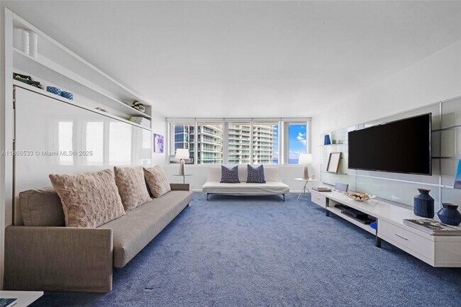 Building Photo - 10275 Collins Ave