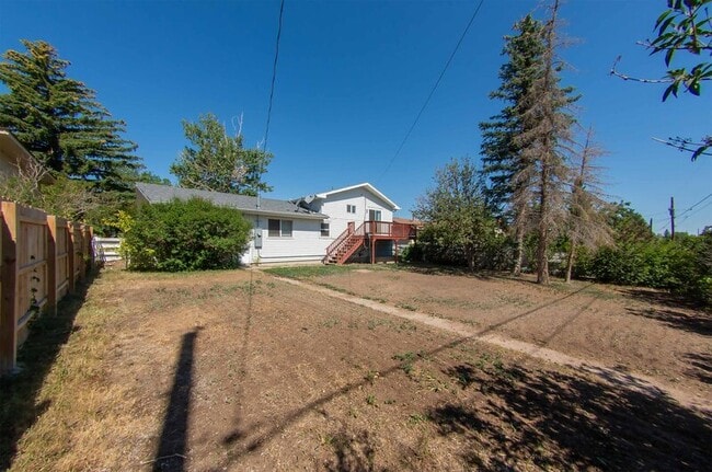 Building Photo - 6921 Manhattan Ln