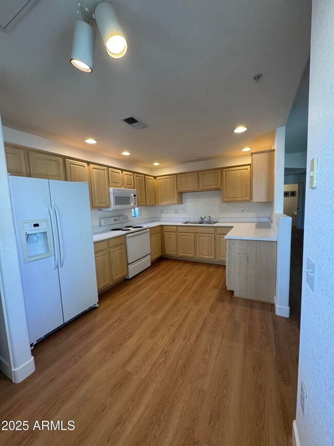 Building Photo - 9555 E Raintree Dr