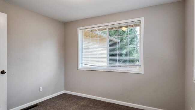 Building Photo - Charming 3BR Home with Massive Fenced in Yard