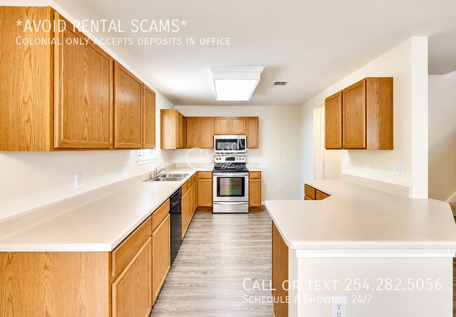 Building Photo - 6812 Doyal Dr