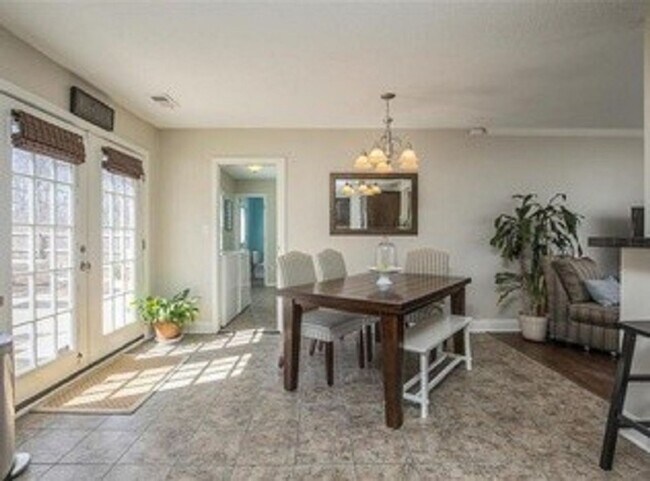 Building Photo - {5611} Updated OP Ranch + Two Car Garage + Fenced Yard and Stamped Concrete Patio Perfect for Spr...