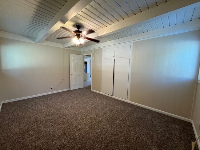 Building Photo - 2 bed 1 bath single family home with back yard and garage space