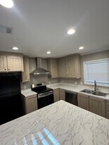 Building Photo - 9027 Fairglade Dr N