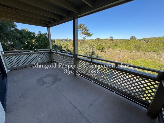 Building Photo - Spacious 2-Bed, 2-Bath Condo with Fireplac...