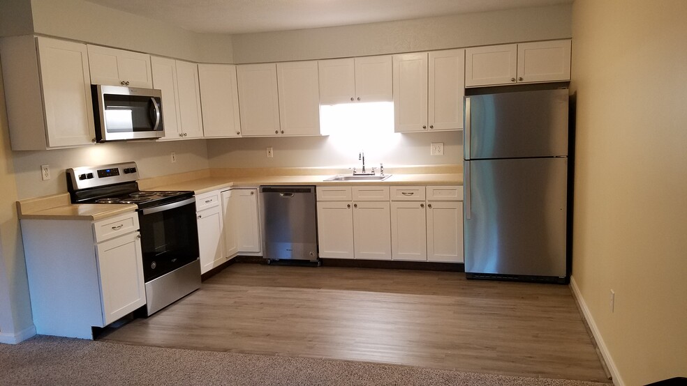 Updated kitchen with brand new SS appliances. - 1901 Bodwell Rd