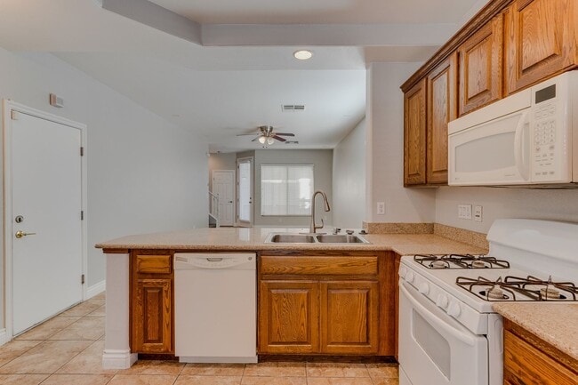 Building Photo - Gated Townhome with Strip Views from the Balcony!