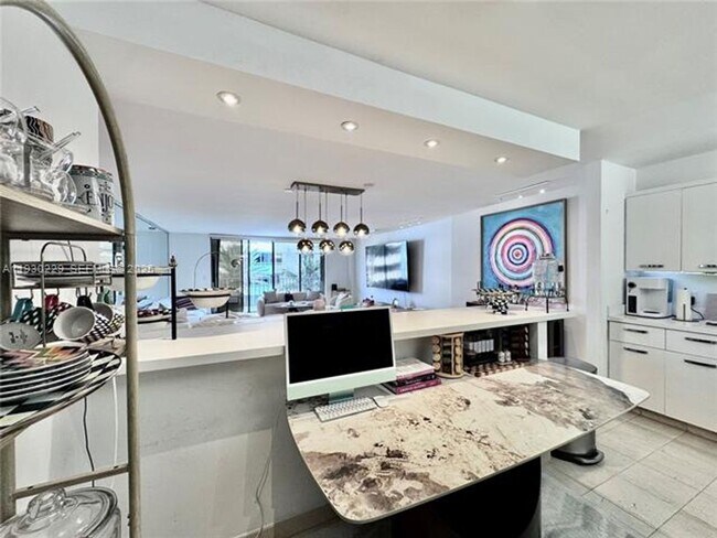 Building Photo - 8877 Collins Ave