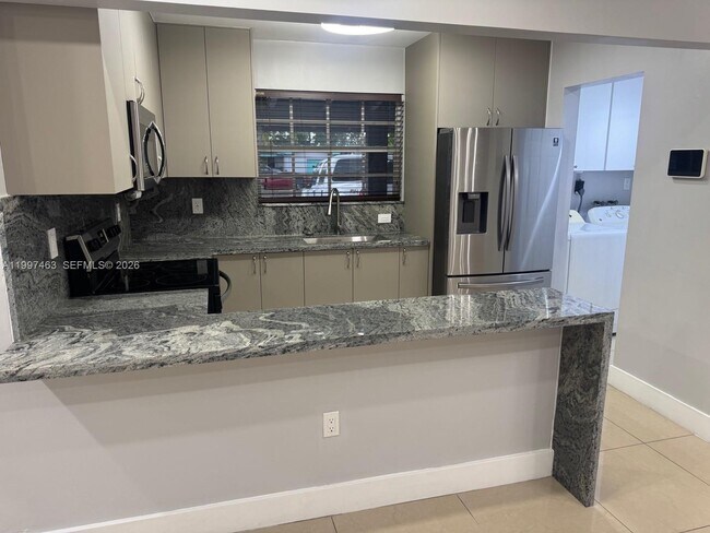 Building Photo - 7541 Miramar Pkwy