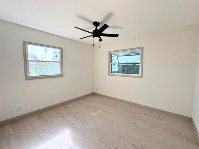 Building Photo - Fully Renovated 2BR Home with Designer Finishes & Fenced Yard