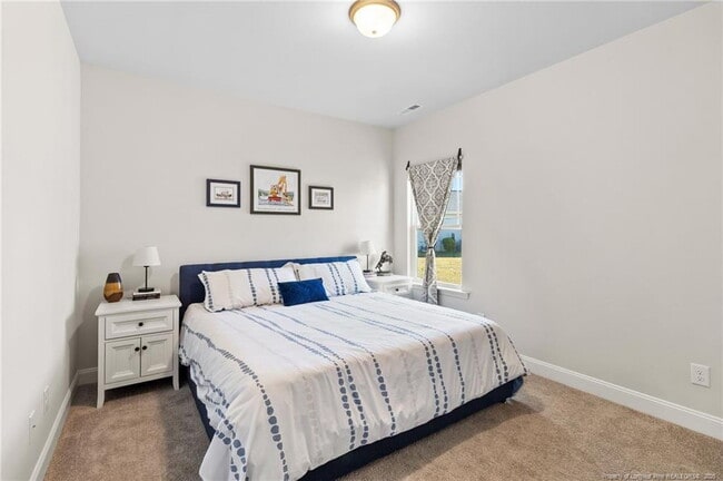Building Photo - Charming 4-Bed home with Granite Touches & Cozy Fireplace in Sanford, NC!