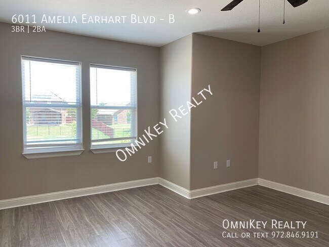 Building Photo - 6011 Amelia Earhart Blvd