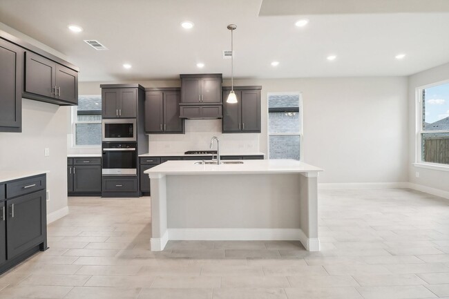 Building Photo - Brand New 4 Bed 2 Bath 2 and Half car gara...