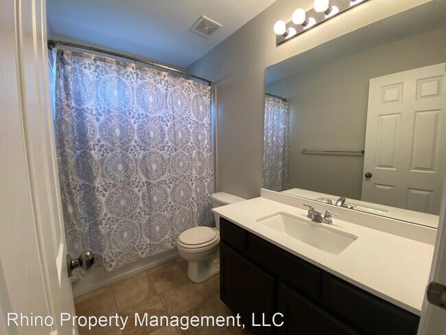 Building Photo - 6 br, 3.5 bath House - 8099 Pine Lake Circle