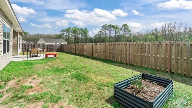 Building Photo - Relax & Unwind at this 4-Bedroom Home with Scenic Lagoon Views in Rincon