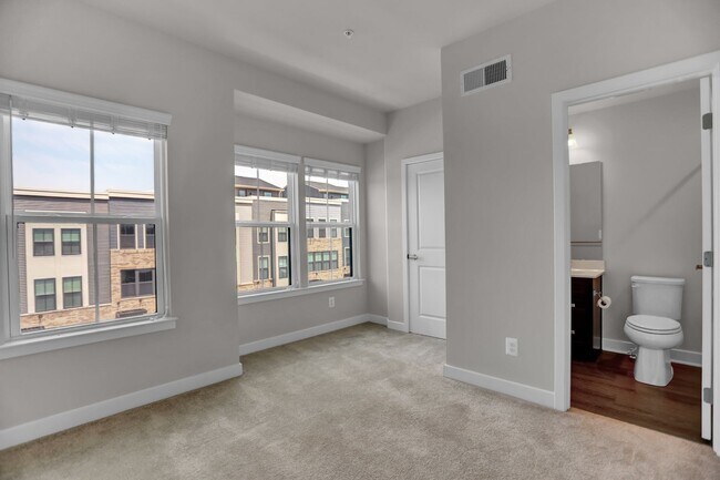 Building Photo - Luxury 4-Story Townhome with Rooftop Terrace!